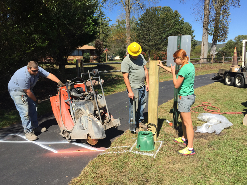 Kristy Jackson and team install an embedded greenway monitoring sensor