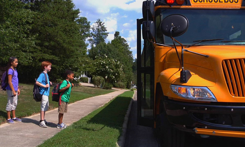 Kids Waiting to Board Bus