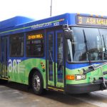 An active ART bus in Asheville shows the 13 Ash Mall stop