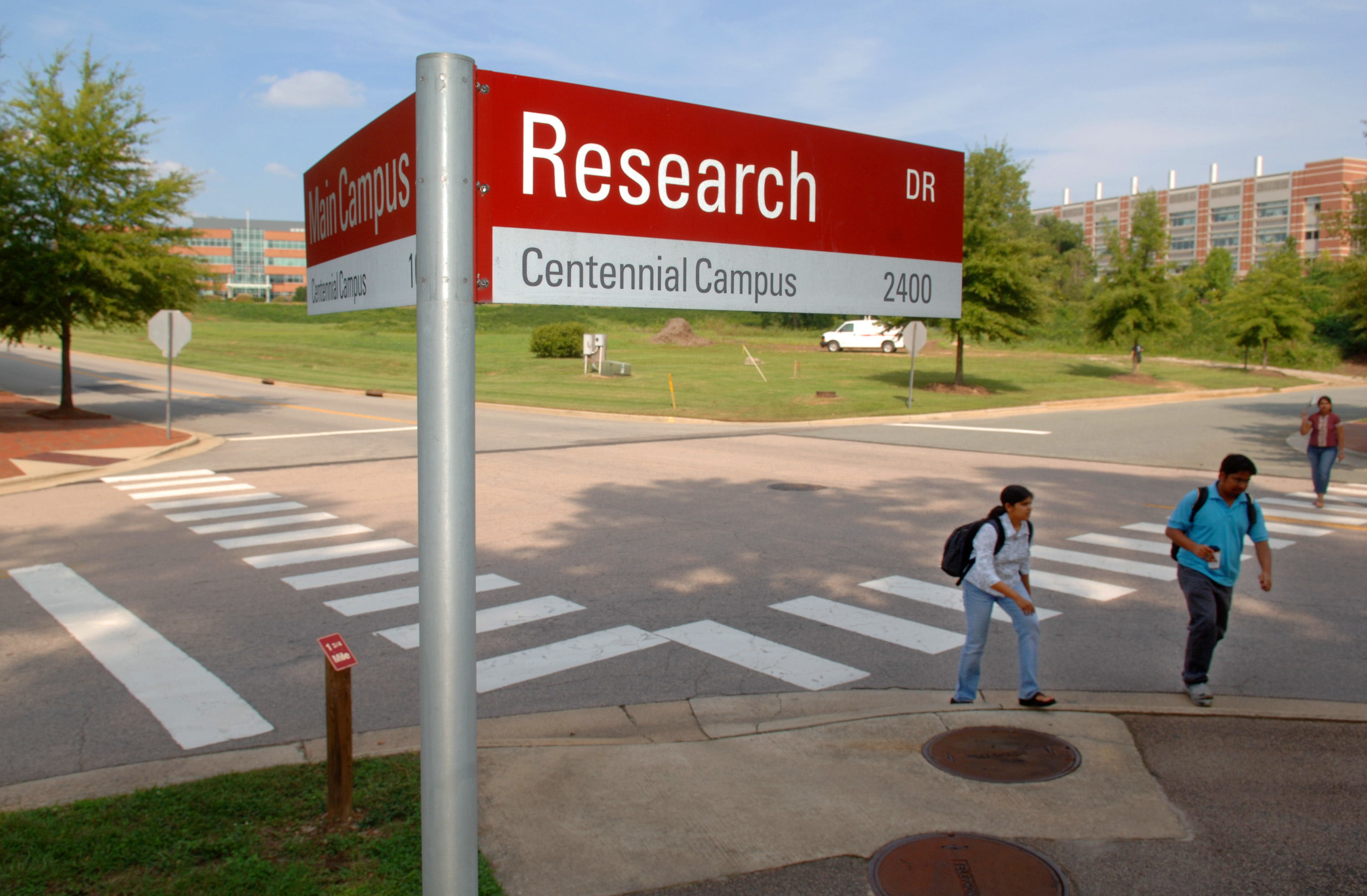 Students make their way across Centennial Campus at the corner of research drive